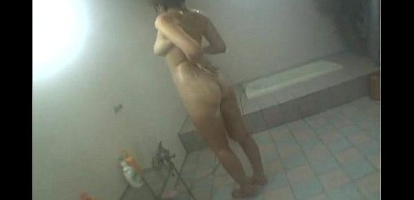  Asian bitch has a shower and a cock to suck
